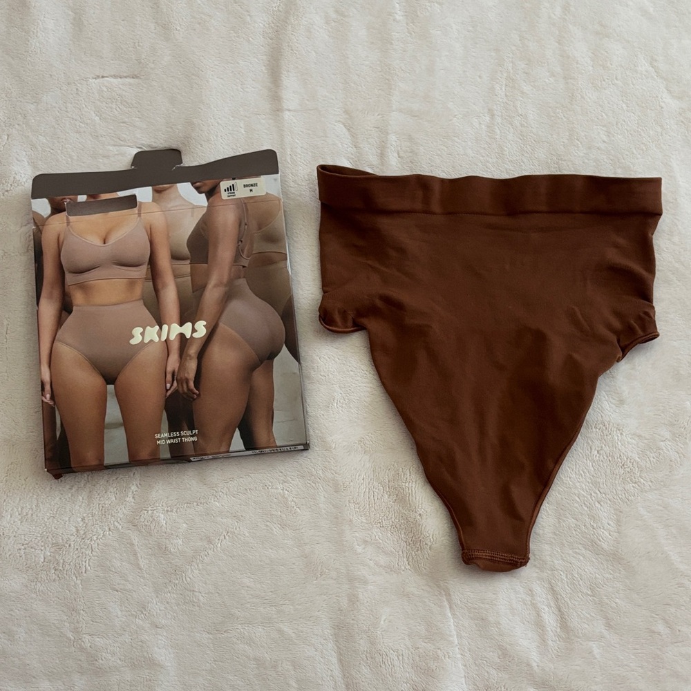 SKIMS Seamless Sculpt Mid Waist Thong in Bronze